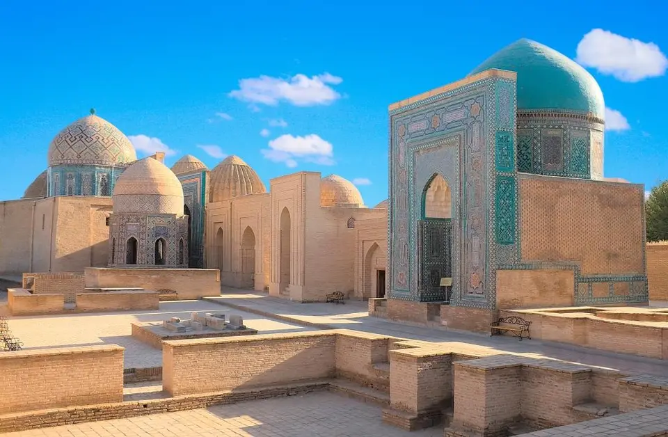 Domed tombs and a turquoise portal in Samarkand